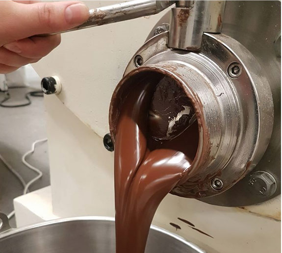 Pouring of chocolate